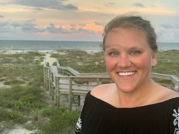 photo of Kaci Allen on a beach